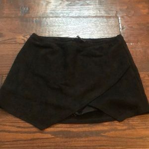 Black suede skort from boutique